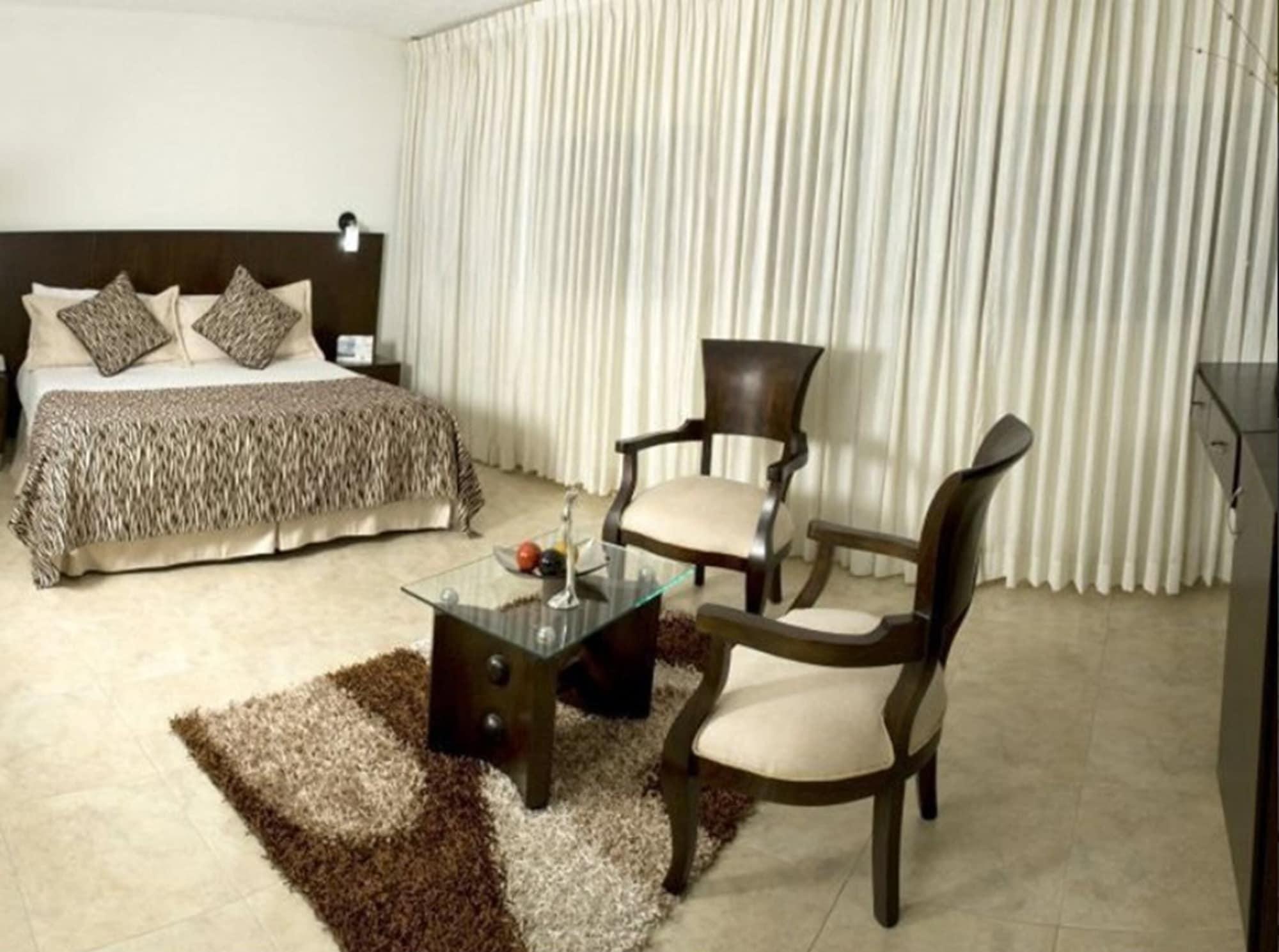 塞尔科蒂尔国际赌场酒店 Cúcuta 外观 照片 A bedroom at the hotel