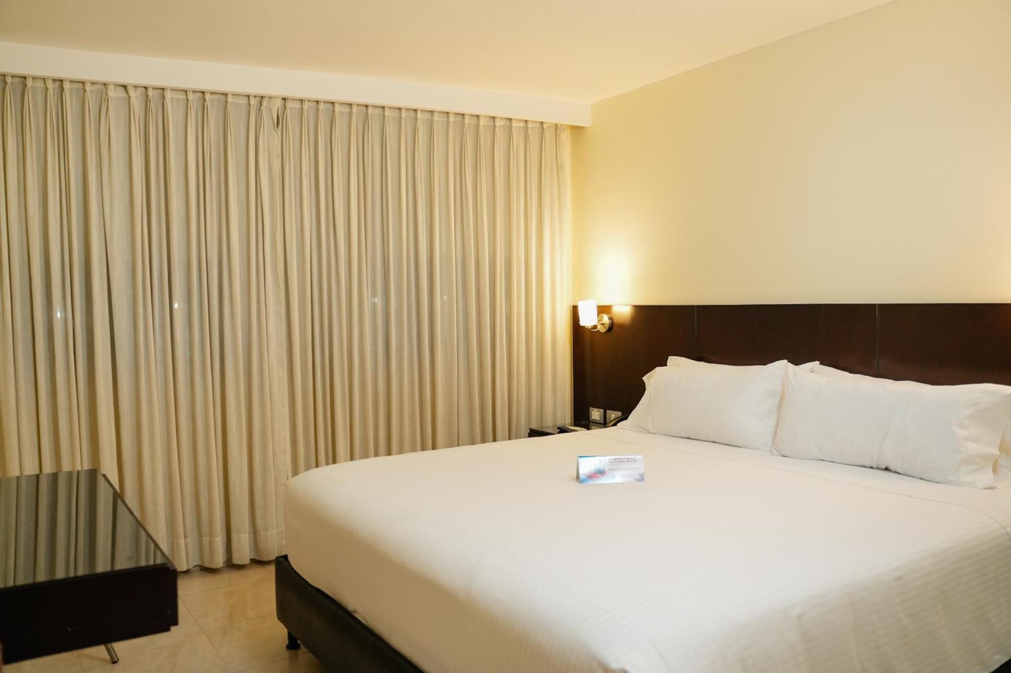 塞尔科蒂尔国际赌场酒店 Cúcuta 外观 照片 A bedroom at the hotel